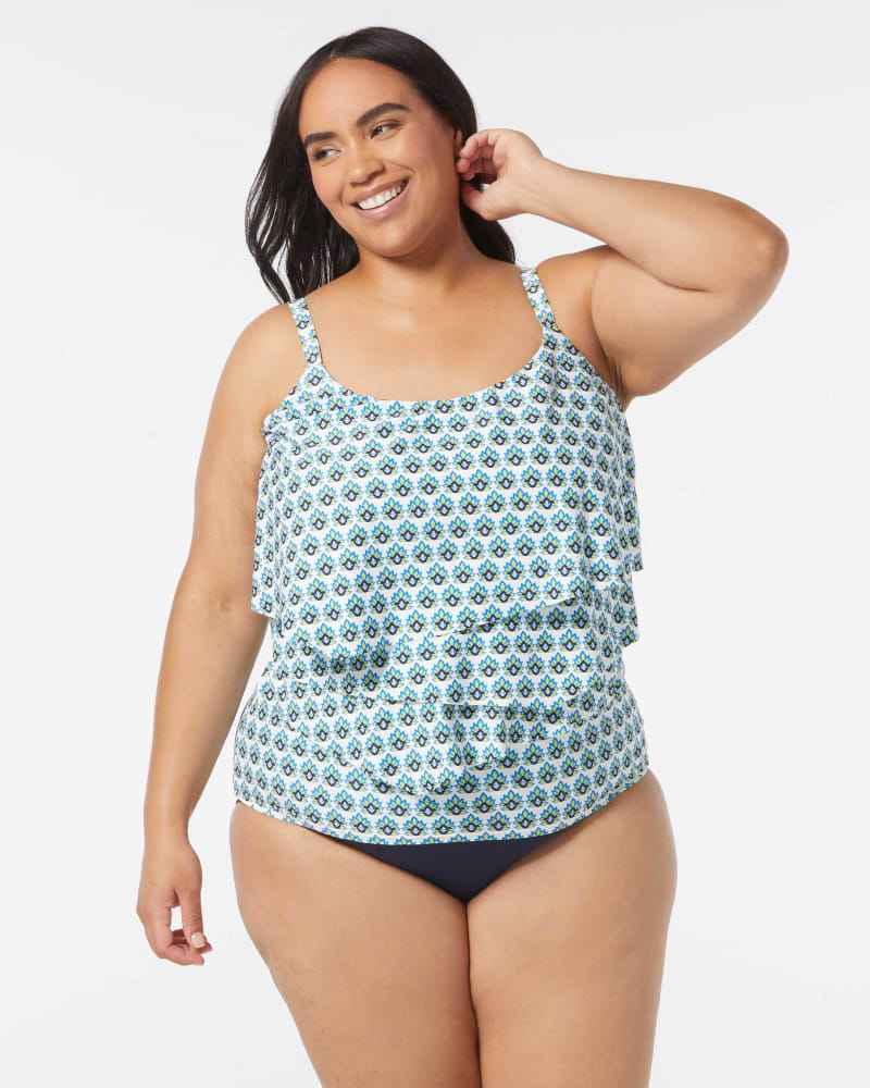 Front of a model wearing a size 38E AURA RUFFLE TANKINI in WHITE MLTI by Coco Reef. | dia_product_style_image_id:332643